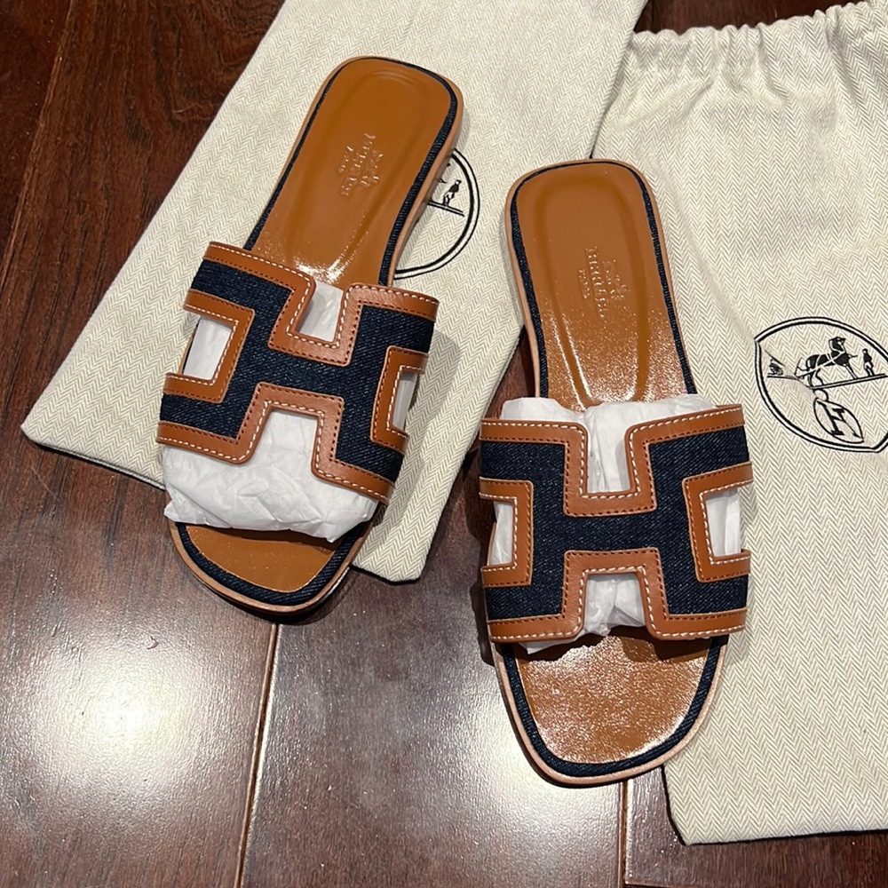 Brand new never worn designer flats with dust bag